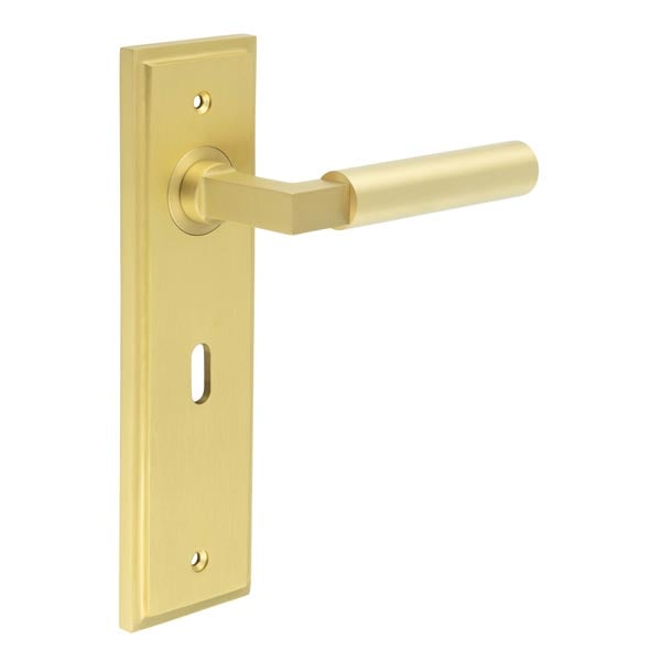 This is an image showing the Frelan - Westminster Door Handle Lock Backplate Satin Brass available to order from Trade Door Handles in Kendal