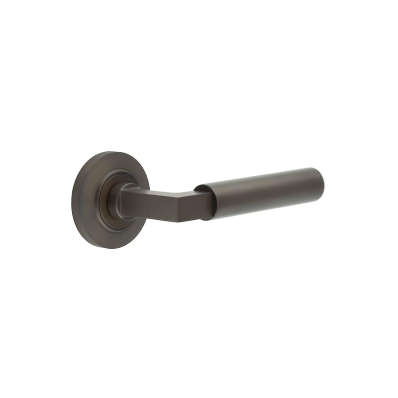 This is an image showing the Frelan - Westminster Door Handle on Chamfered Rose Dark Bronze available to order from Trade Door Handles in Kendal