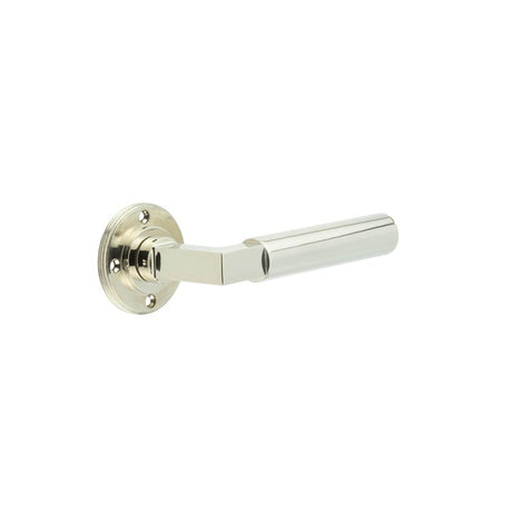 This is an image showing the Burlington - Westminster lever on rose - Polished Nickel available to order from Trade Door Handles in Kendal