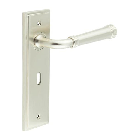 This is an image showing the Frelan - Highgate Door Handle Lock Backplate Satin Nickel available to order from Trade Door Handles in Kendal