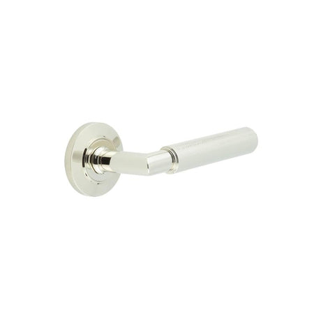 This is an image showing the Frelan - Piccadilly Door Handle on Chamfered Rose Polished Nickel available to order from Trade Door Handles in Kendal