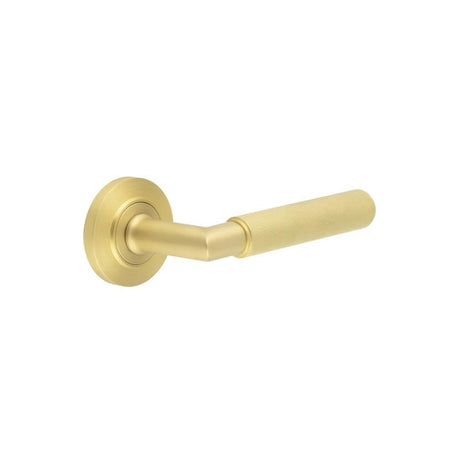 This is an image showing the Frelan - Piccadilly Door Handle on Chamfered Rose Satin Brass available to order from Trade Door Handles in Kendal