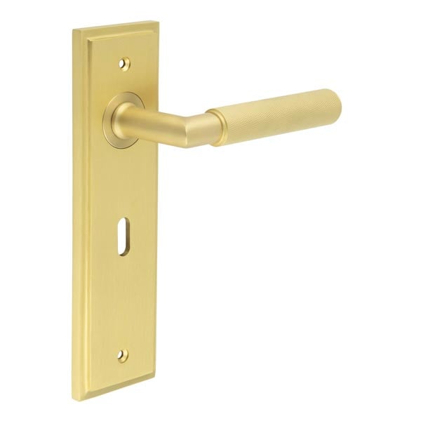 This is an image showing the Frelan - Piccadilly Door Handle Lock Backplate Satin Brass available to order from Trade Door Handles in Kendal