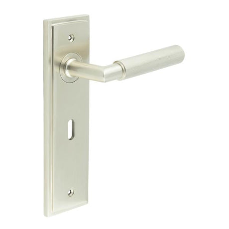 This is an image showing the Frelan - Piccadilly Door Handle Lock Backplate Satin Nickel available to order from Trade Door Handles in Kendal