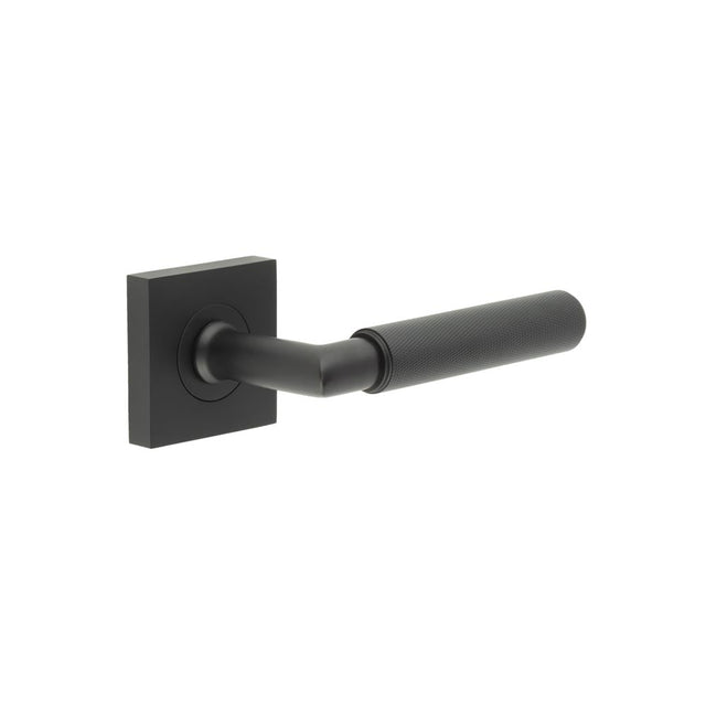 This is an image showing the Frelan - Piccadilly Door Handle on Square Plain Rose Black available to order from Trade Door Handles in Kendal