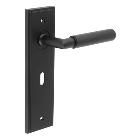 This is an image showing the Frelan - Piccadilly Door Handle Lock Backplate Black available to order from Trade Door Handles in Kendal