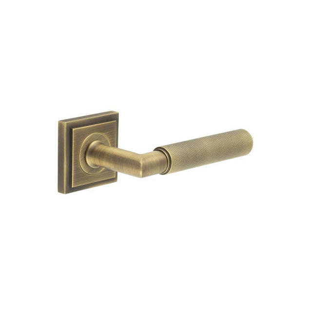 High quality image of Burlington - Piccadilly Door Handle on Stepped Square Rose Antique Brass Sku. BUR40KIT7