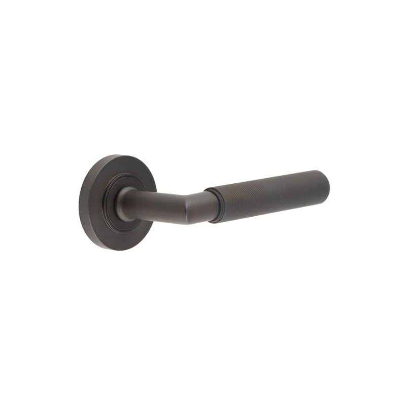 This is an image showing the Frelan - Piccadilly Door Handle on Plain Rose Dark Bronze available to order from Trade Door Handles in Kendal