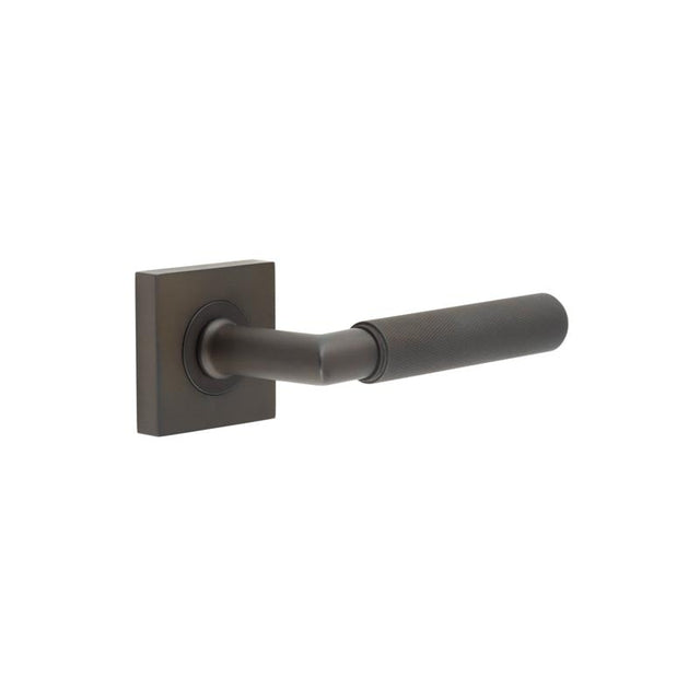 This is an image showing the Frelan - Piccadilly Door Handle on Square Plain Rose Dark Bronze available to order from Trade Door Handles in Kendal