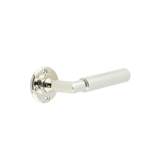 This is an image showing the Burlington - Piccadilly lever on rose - Polished Nickel available to order from Trade Door Handles in Kendal