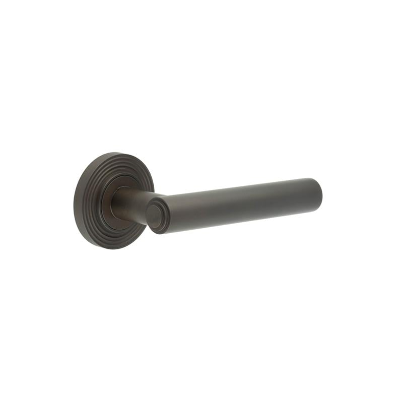 This is an image showing the Frelan - Richmond Door Handles Reeded Rose Dark Bronze available to order from Trade Door Handles in Kendal