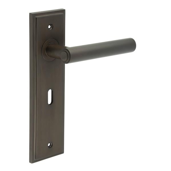 This is an image showing the Frelan - Highgate Door Handle Lock Backplate Dark Bronze available to order from Trade Door Handles in Kendal