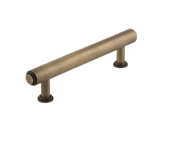 This is an image showing the Burlington - Belgrave Cabinet Handle 128mm CTC - Antique Brass available to order from Trade Door Handles in Kendal