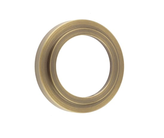 This is an image showing the Burlington - Stepped outer rose for ESC - Antique Brass available to order from Trade Door Handles in Kendal