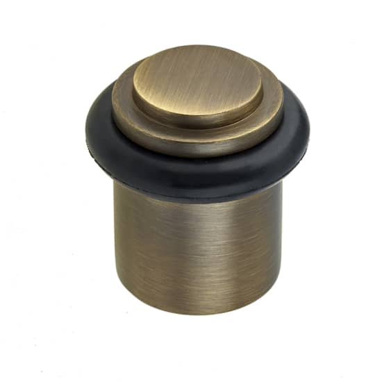 High quality image of Burlington - Stepped Door Stops Antique Brass Sku. BUR962AB