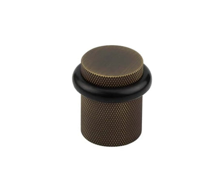 High quality image of Burlington - Knurled Floor Mounted Doorstops 40mm Dia Antique Brass Sku. BUR964AB