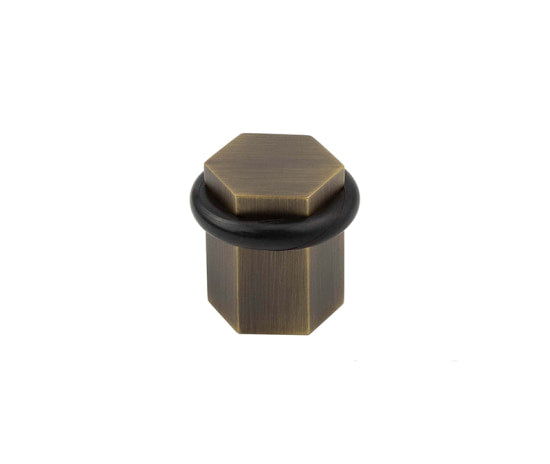 High quality image of Burlington - Hexagonal Floor Mounted Doorstops Antique Brass Sku. BUR965AB