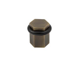 High quality image of Burlington - Hexagonal Floor Mounted Doorstops Antique Brass Sku. BUR965AB