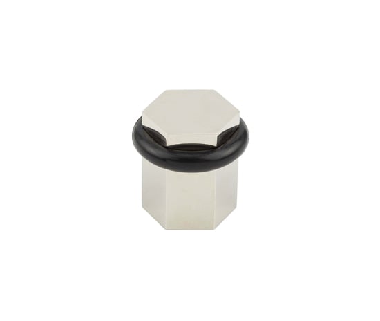 This is an image showing the Burlington - PN hexagonal floor mounted door stop available to order from Trade Door Handles in Kendal