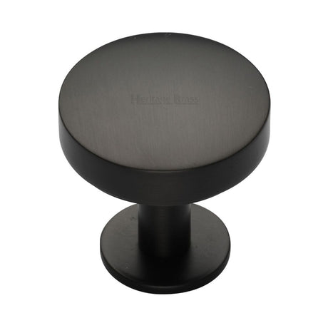 High quality image of Heritage Brass - Cabinet Knob Domed Disc Design with Rose 38mm Matt Bronze Finis | Sku. c3878-38-mb | Trade Door Handles, Kendal.