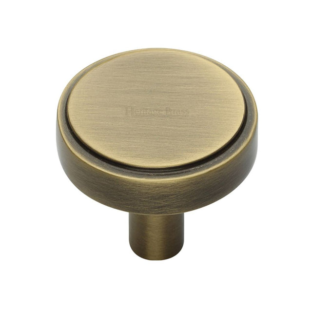 High quality image of Heritage Brass - Cabinet Knob Stepped Disc Design 38mm Antique Brass Finish | Sku. c3952-38-at | Trade Door Handles, Kendal.