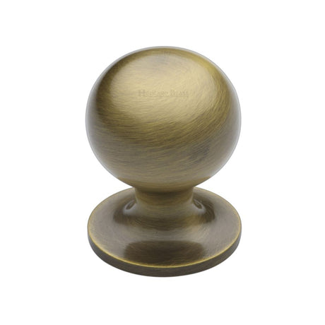 High quality image of Heritage Brass - Cabinet Knob Ball Design 25mm Antique Brass Finish | Sku. c8321-25-at | Trade Door Handles, Kendal.