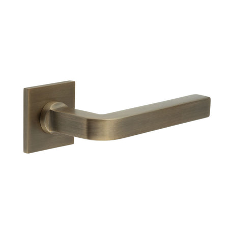 High quality image of CRES - CR-104 Antique Brass Sprung Square Rose Door Handle Sku. CR-104B1AB