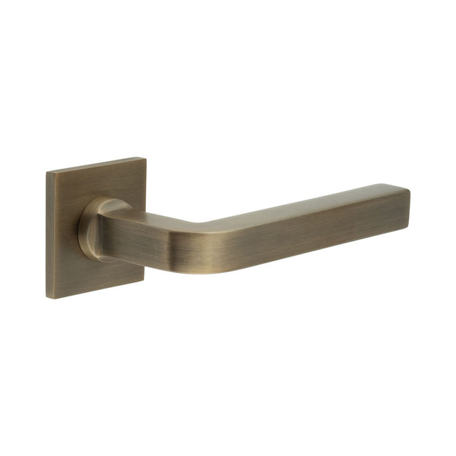 High quality image of CRES - CR-104 Antique Brass Sprung Square Rose Door Handle Sku. CR-104B1AB