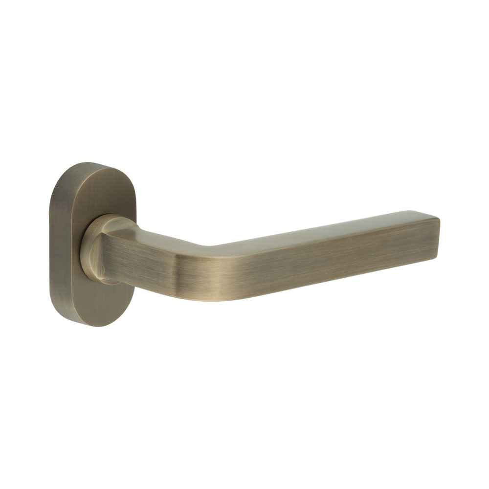 High quality image of CRES - CR-104 Antique Brass Multi Point Oval Rose Door Handle Sku. CR-104C4AB