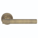 This is an image of Eurospec - Philadelphia Lever on Sprung Rose - Antique Brass- CSL1194AB available to order from Trade Door Handles in Kendal.