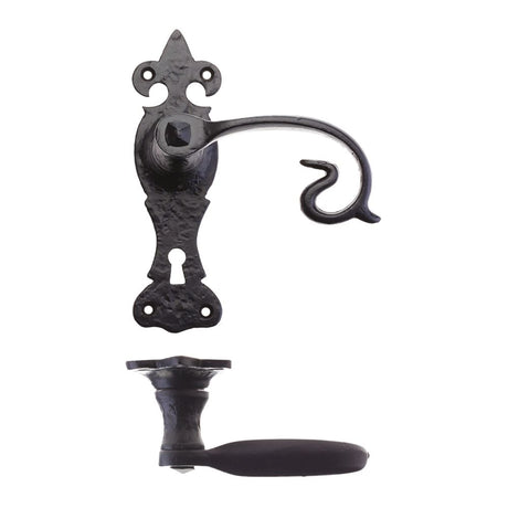 High quality image of the Foxcote Foundries - Scroll Lever on Fleur De Lys Backplate - 6" - Lock - Antique Black | Sku. ff311 | available to order from Trade Door Handles.