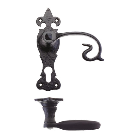 High quality image of the Foxcote Foundries - Scroll Lever on Fleur De Lys Backplate - 6" - Euro - Antique Black | Sku. ff311ep | available to order from Trade Door Handles.