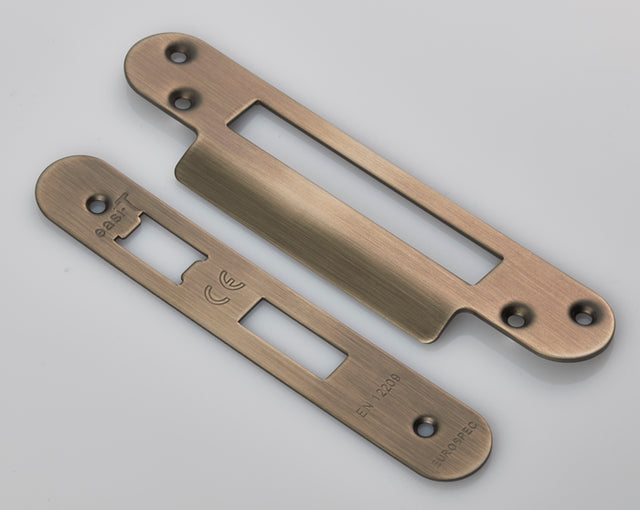 High quality image of Eurospec - Forend Strike & Fixing Pack to suit Architectural Sashlocks (BAS/ESS) - Antique Brass | Sku. fsf5004ab-r | Trade Door Handles.