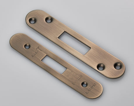 High quality image of Eurospec - Forend Strike & Fixing Pack to suit Architectural Deadlocks (EDS/LDS) - Antique Brass | Sku. fsf5007ab-r | Trade Door Handles.