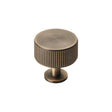 High quality image of Carlisle Brass - Lines Radio Knob - Antique Brass | Sku. ftd713ab | Trade Door Handles.