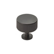 High quality image of Carlisle Brass - Lines Radio Knob - Matt Black | Sku. ftd713mb | Trade Door Handles.
