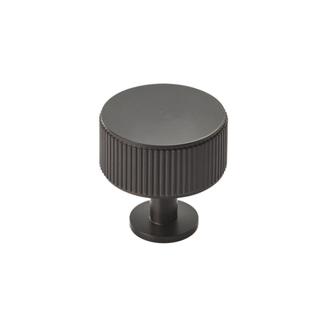 High quality image of Carlisle Brass - Lines Radio Knob - Matt Black | Sku. ftd713mb | Trade Door Handles.