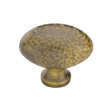 High quality image of Heritage Brass - Cabinet Knob Victorian Oval Hammered Design 38mm Antique Brass finish | Sku. ham114-38-at | available to order from Trade Door Handles in Kendal.
