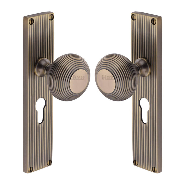 Heritage Brass Door Furniture Antique Brass / Mortice Knobs Heritage Brass Mortice Knob on Reeded Euro Profile Plate Beehive Design Antique Brass finish