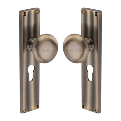 Heritage Brass Door Furniture Antique Brass / Mortice Knobs Heritage Brass Mortice Knob on Reeded Euro Profile Plate Victoria Design Antique Brass finish