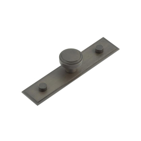 This is an image showing the Frelan - Cropley Cupboard Knobs 30mm Stepped Backplate Dark Bronze available to order from Trade Door Handles in Kendal