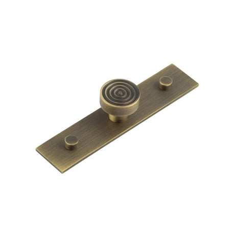 This is an image showing the Frelan - Murray Cupboard Knobs 30mm Plain Backplate Antique Brass available to order from Trade Door Handles in Kendal