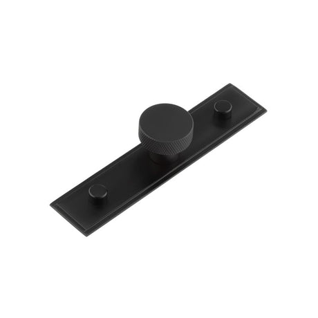 This is an image showing the Frelan - Wenlock Cupboard Knobs 30mm Stepped Backplate Matt Black available to order from Trade Door Handles in Kendal