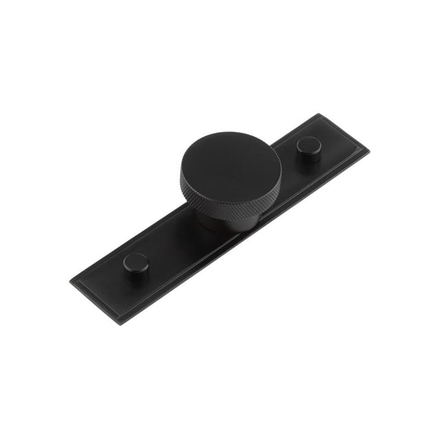 This is an image showing the Frelan - Wenlock Cupboard Knobs 40mm Stepped Backplate Matt Black available to order from Trade Door Handles in Kendal