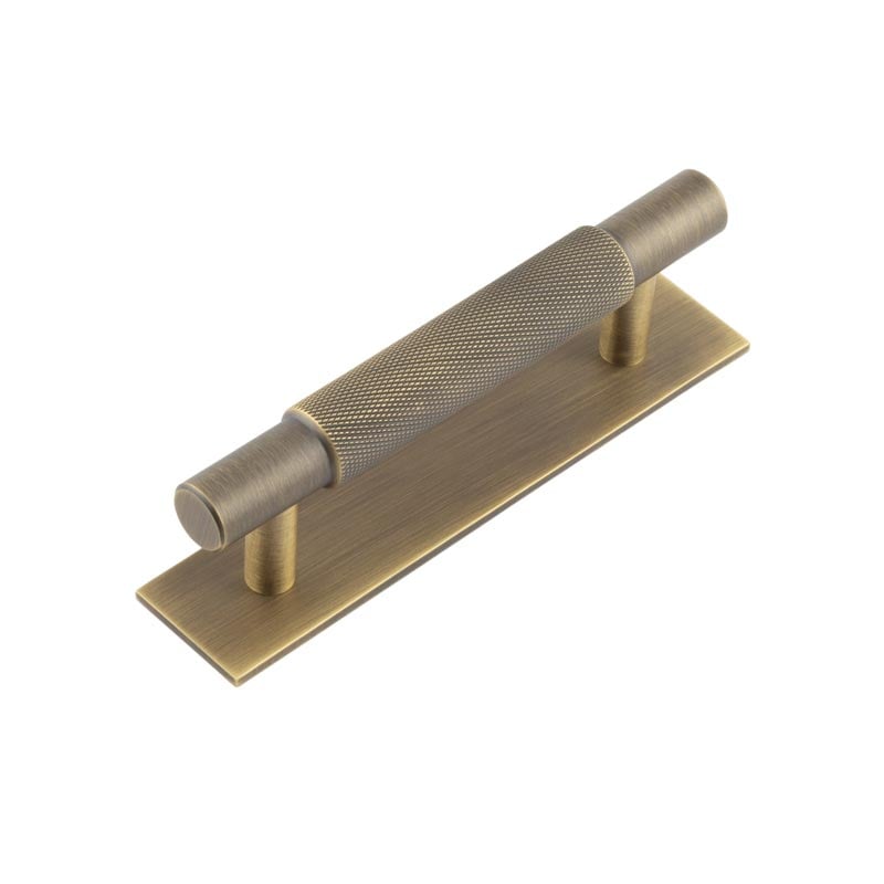 This is an image showing the Frelan - Hoxton Taplow Cabinet Handles 96mm Ctrs Plain Backplate Antique Brass available to order from Trade Door Handles in Kendal