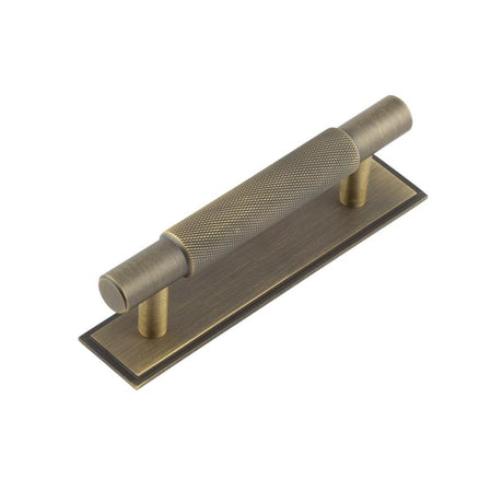 This is an image showing the Frelan - Hoxton Taplow Cabinet Handles 96mm Ctrs Stepped Backplate Antique Brass available to order from Trade Door Handles in Kendal