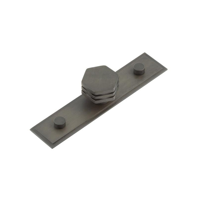 This is an image showing the Frelan - Nile Cupboard Knobs 30mm Stepped Dark Bronze available to order from Trade Door Handles in Kendal