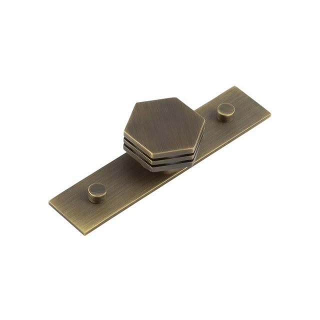 This is an image showing the Frelan - Nile Cupboard Knobs 40mm Plain Antique Brass available to order from Trade Door Handles in Kendal