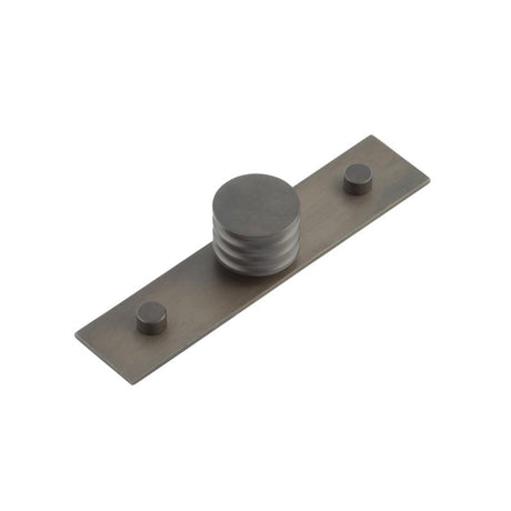 This is an image showing the Frelan - Sturt Cupboard Knobs 30mm Plain Dark Bronze available to order from Trade Door Handles in Kendal