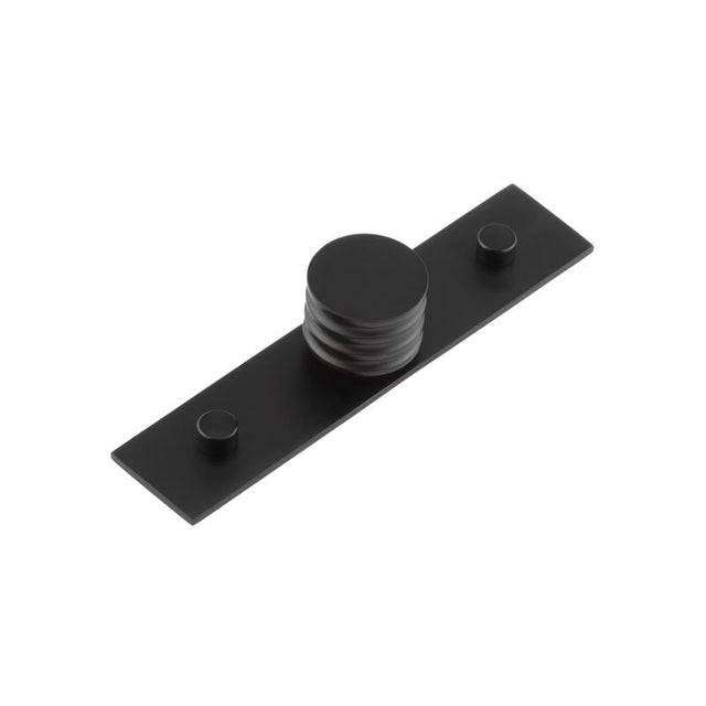 This is an image showing the Frelan - Sturt Cupboard Knobs 30mm Plain Matt Black available to order from Trade Door Handles in Kendal